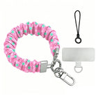 Peppermint Cutie scrunchie phone wrist strap laid flat with silver clasp and phone tab, pink with mint peppermints and candy canes
