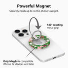 Garden Party pattern MagSafe phone grip ring with pink and white roses on a deep forest green background compatible with iPhone and Samsung