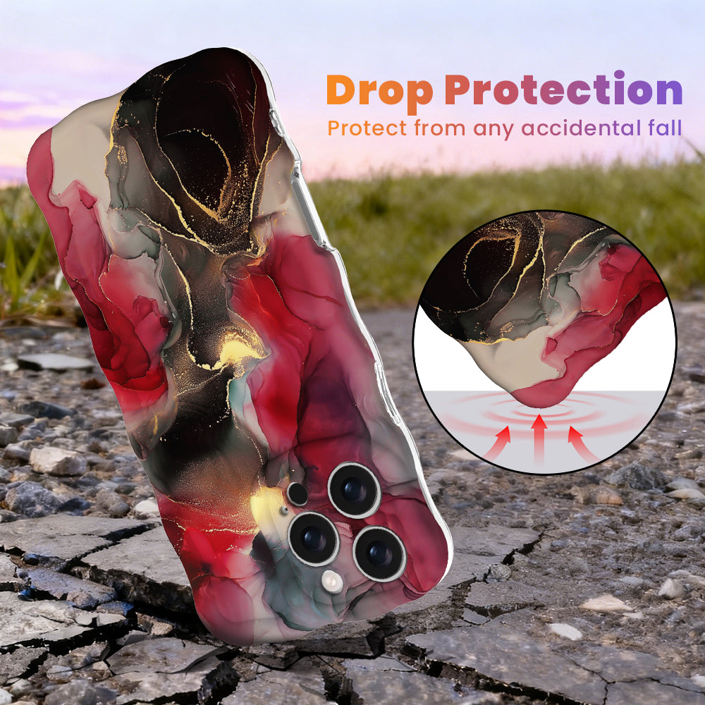Drop protection graphic for the Velvet Vixen Wavy Luxe MagSafe iPhone case, crimson and black alcohol-ink marble with gold veining, showing the cushioned wavy edges.