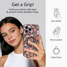 Woman taking a selfie while holding an iPhone by the Merry Mugs & Ginger Hugs grip ring; easy selfies, more comfort and video stand
