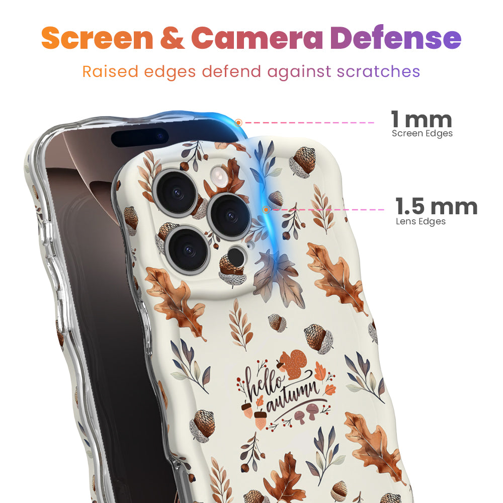 Screen and camera defense diagram for the Nutty For Fall iPhone case, showing the 1 mm raised screen edge and 1.5 mm raised lens edge, with the hello autumn script visible on the cream print.