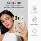 Front view of Sweater Weather Sweetheart MagSafe grip ring highlighting the cream knit texture with taupe bows and brown heart accents.