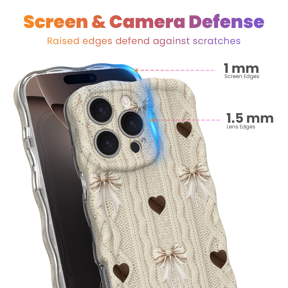 Back detail of Sweater Weather Sweetheart Wavy Luxe MagSafe iPhone case showing the camera cutout and full cream, taupe, and brown print layout.
