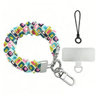 Mod Mood Scrunchie Phone Wrist Strap shown with its metal clasp, black cord and phone attachment tab, printed with turquoise, lime and hot pink rounded squares.