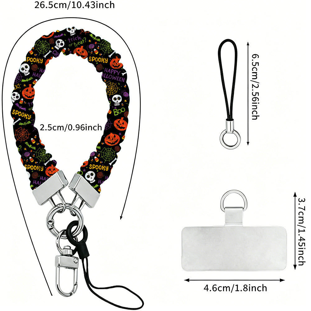 Size diagram for the Spooky scrunchie phone wrist strap, black with pumpkins and skulls, showing the 26.5 cm loop and 2.5 cm width.