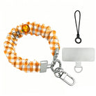 Happy Fall Y'all orange gingham and pumpkin scrunchie phone wrist strap from Fancy Bands