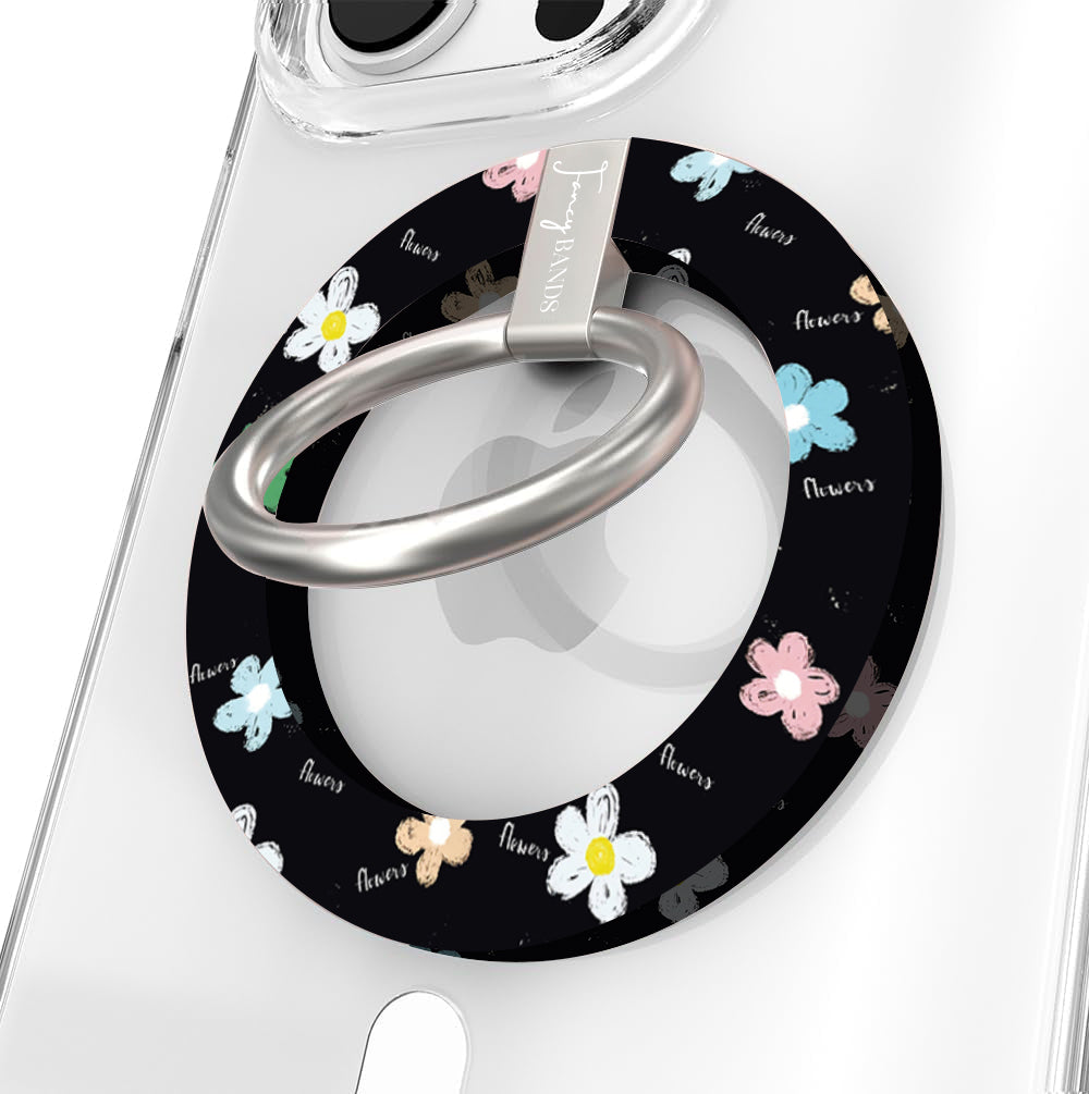 Flower Pop pattern MagSafe phone grip ring with sketched colorful flowers and script text on black background compatible with iPhone and Samsung