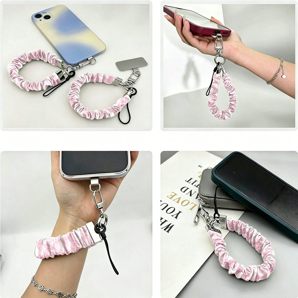 Four views of the Blush Manor Scrunchie Phone Wrist Strap clipped to a phone case, held in the hand, worn on the wrist and resting on a book.