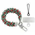 Plaid Tidings & Bows scrunchie phone wrist strap laid flat with silver clasp and phone tab, red bows on green gingham