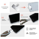 3 steps to attach a Plaid Tidings & Bows scrunchie phone wrist strap: pass the tab through the charging port, fit the case, clip on the wrist strap