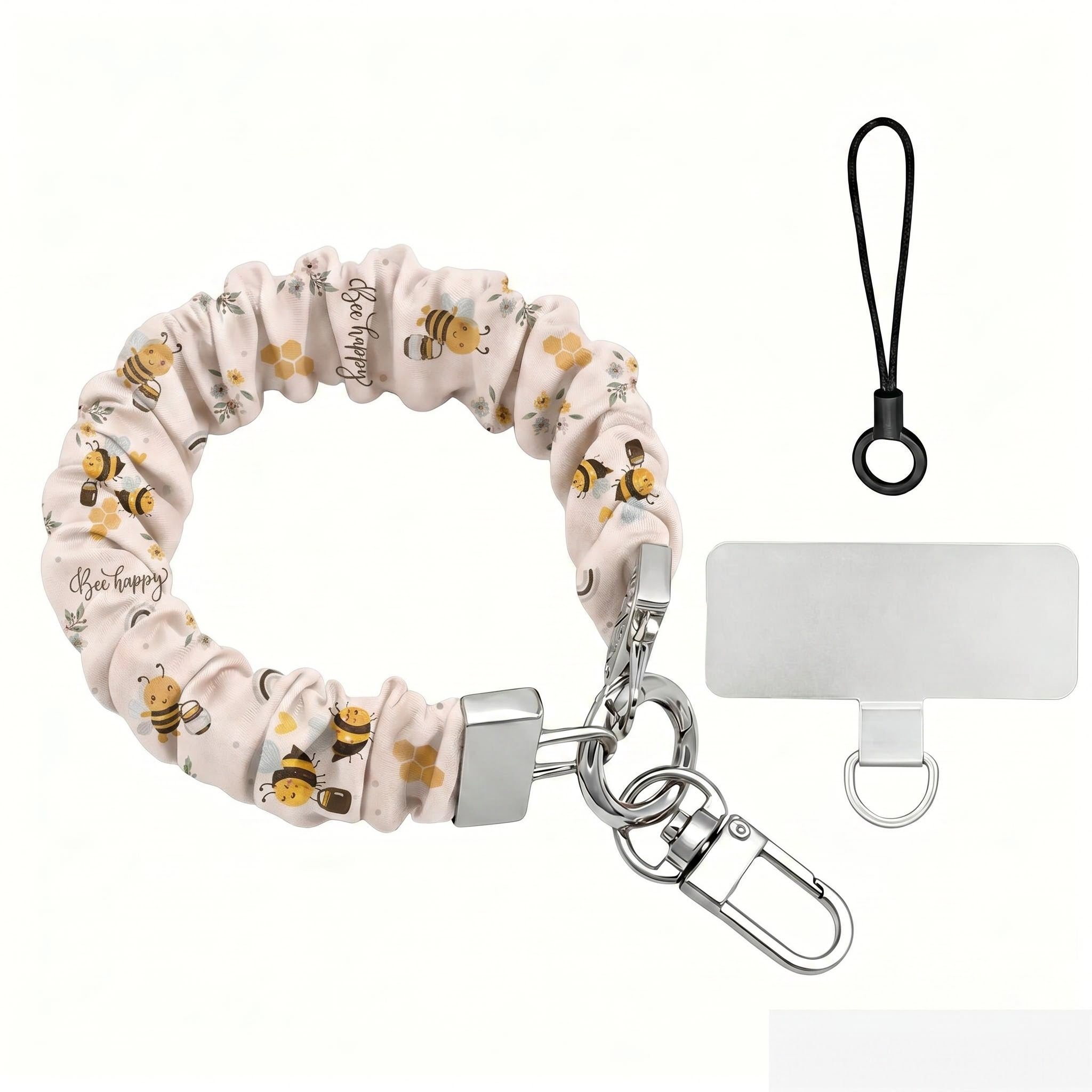 A sweet Bee Happy scrunchie phone wrist strap in a white bumblebee, honeycomb, and honey-pot print, clipped to the matching Bee Happy Wavy Luxe iPhone case, styled with sunflowers and bees on a soft cream background.