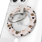 Game Day Darling Hold It Fancy MagSafe grip ring with a cream coquette print of footballs, leopard pumpkins, bows and hearts from Fancy Bands