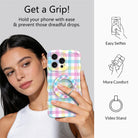 Pastel gingham phone ring grip used as kickstand for hands-free viewing