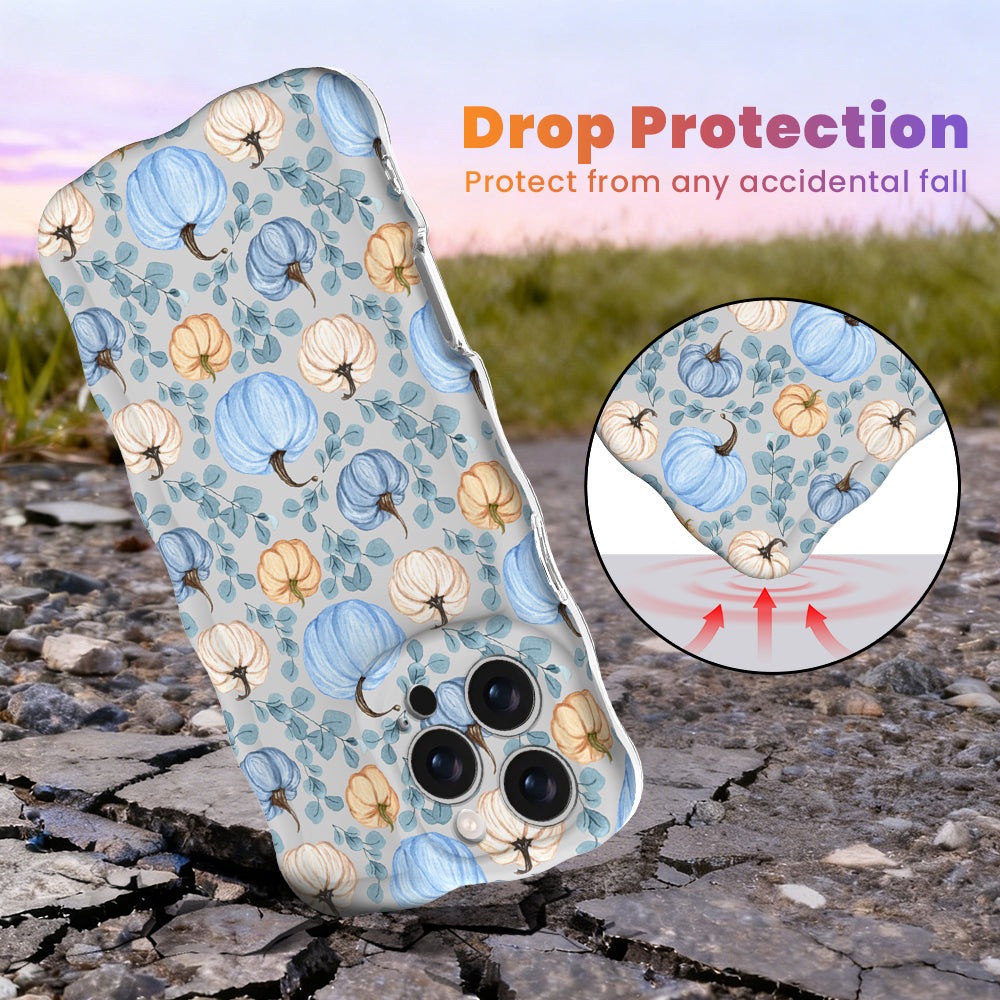 Drop protection diagram for the Blue Belle Pumpkin Patch Wavy Luxe iPhone case, showing the shock-absorbing raised edges that protect the dusty blue pumpkin print against accidental falls.