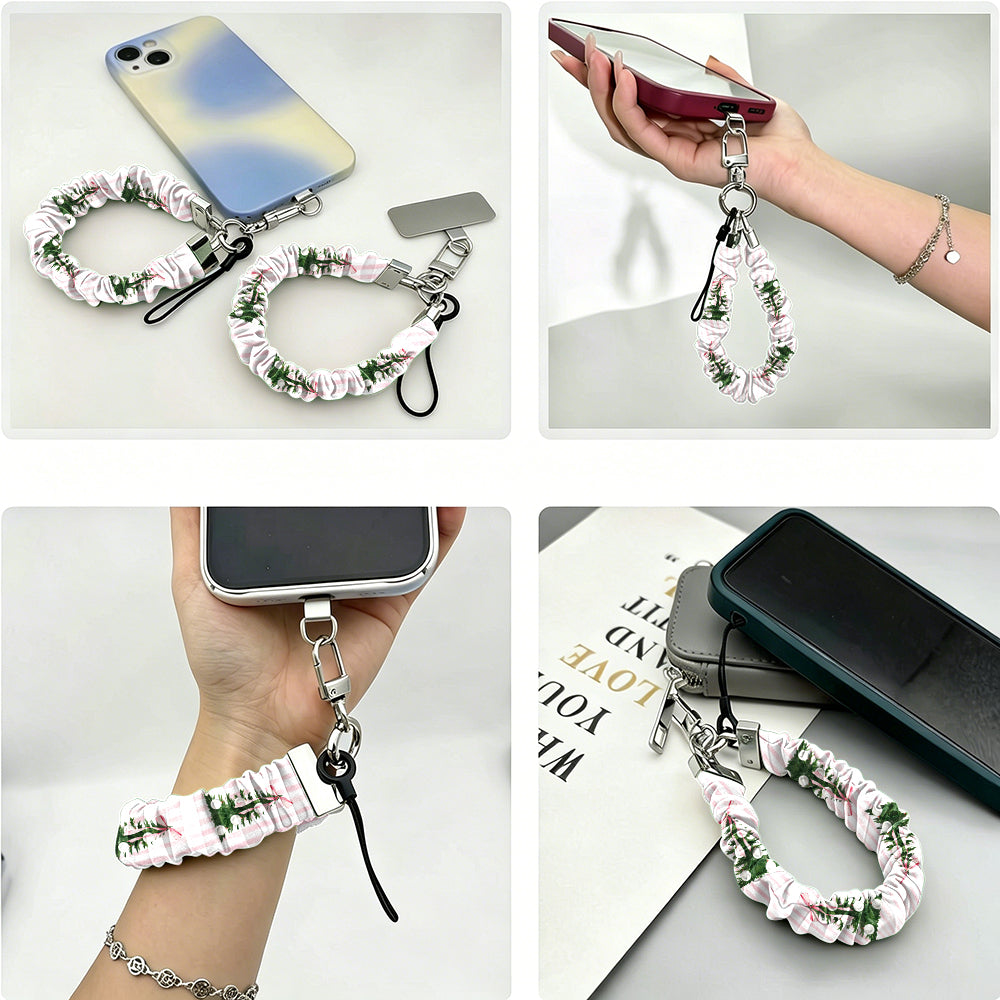 Four views of the Pretty in PinkMas scrunchie phone wrist strap: with its phone tab, dangling from a phone in hand, worn on the wrist, and clipped to a pouch zipper