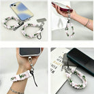 Four views of the Pretty in PinkMas scrunchie phone wrist strap: with its phone tab, dangling from a phone in hand, worn on the wrist, and clipped to a pouch zipper