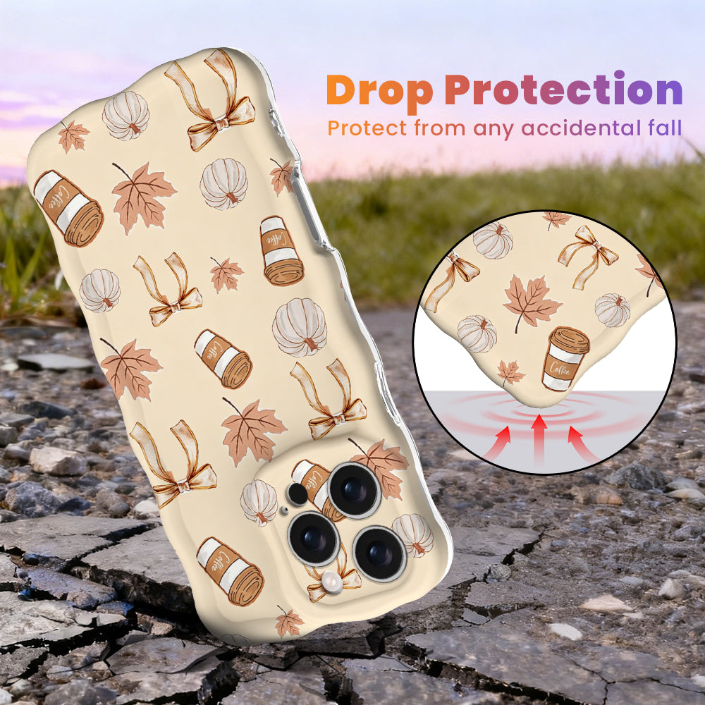 Falling in Love a Latte Wavy Luxe MagSafe iPhone case with a cream coquette print of coffee cups, maple leaves, pumpkins and bows from Fancy Bands