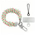 Tinsel & Stardust scrunchie phone wrist strap laid flat, red and green starbursts on cream, with silver clasp, lanyard loop and phone tab