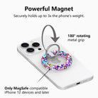 Love Out Loud colorful graffiti heart pattern MagSafe phone grip ring with overlapping neon pink purple and turquoise hearts compatible with iPhone and Samsung