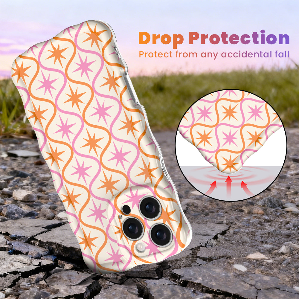 Trendy wavy iPhone case featuring a pink and orange starburst geometric pattern on a cream background with a high-gloss finish.