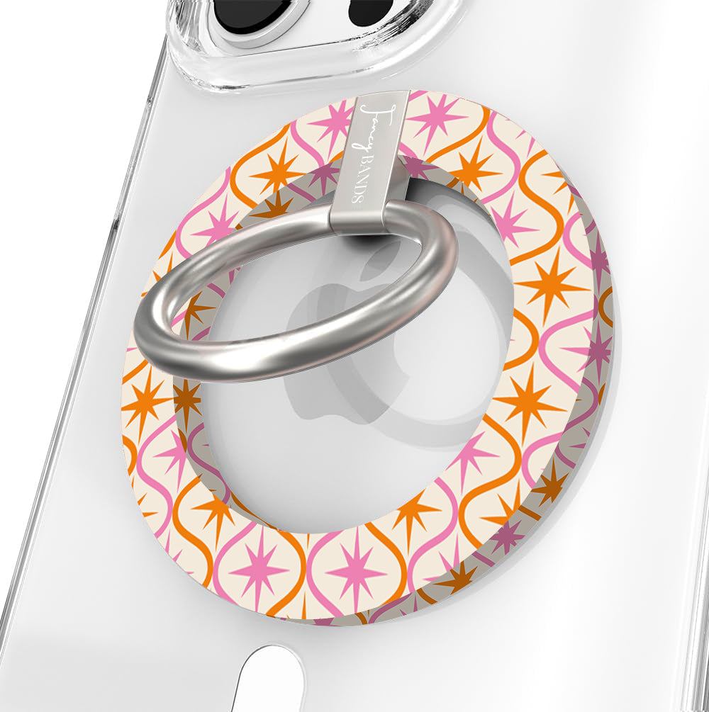 Desert Starburst retro mid-century MagSafe phone grip ring with pink and orange starbursts on a cream background compatible with iPhone and Samsung