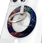 The Wishing Tree mystical fantasy MagSafe phone grip ring with vibrant orange and blue swirling filigree branches on a dark background compatible with iPhone and Samsung