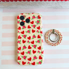 Sweetheart Blooms pattern MagSafe phone grip ring with red hearts and pink roses on cream background compatible with iPhone and Samsung