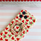 Sweetheart Blooms pattern MagSafe phone grip ring with red hearts and pink roses on cream background compatible with iPhone and Samsung