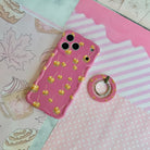 Caramel Coated Cutie MagSafe grip ring shown beside the matching Caramel Coated Cutie iPhone case on pink striped and polka dot paper.