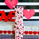 Tick-Tack-Love Apple Watch band with LOVE text, XOXO, and hearts in pink and red on white background with Valentine's decor
