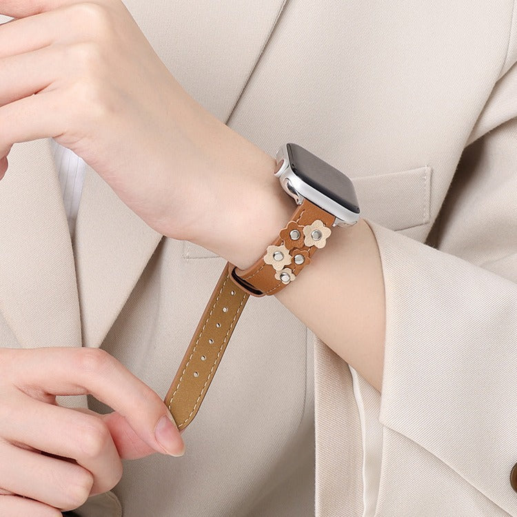 Sweet Saddle slim leather Apple Watch band in saddle tan with floral leather appliqués and silver studs