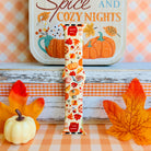 All The Fall Things Apple Watch band single strap half standing upright, showing the cream silicone with pumpkins, pie slices, acorns and turning leaves.