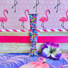 It's Giving Flamingo Apple Watch band with pink flamingos and tropical palm leaves on blue background with flamingo decorations

