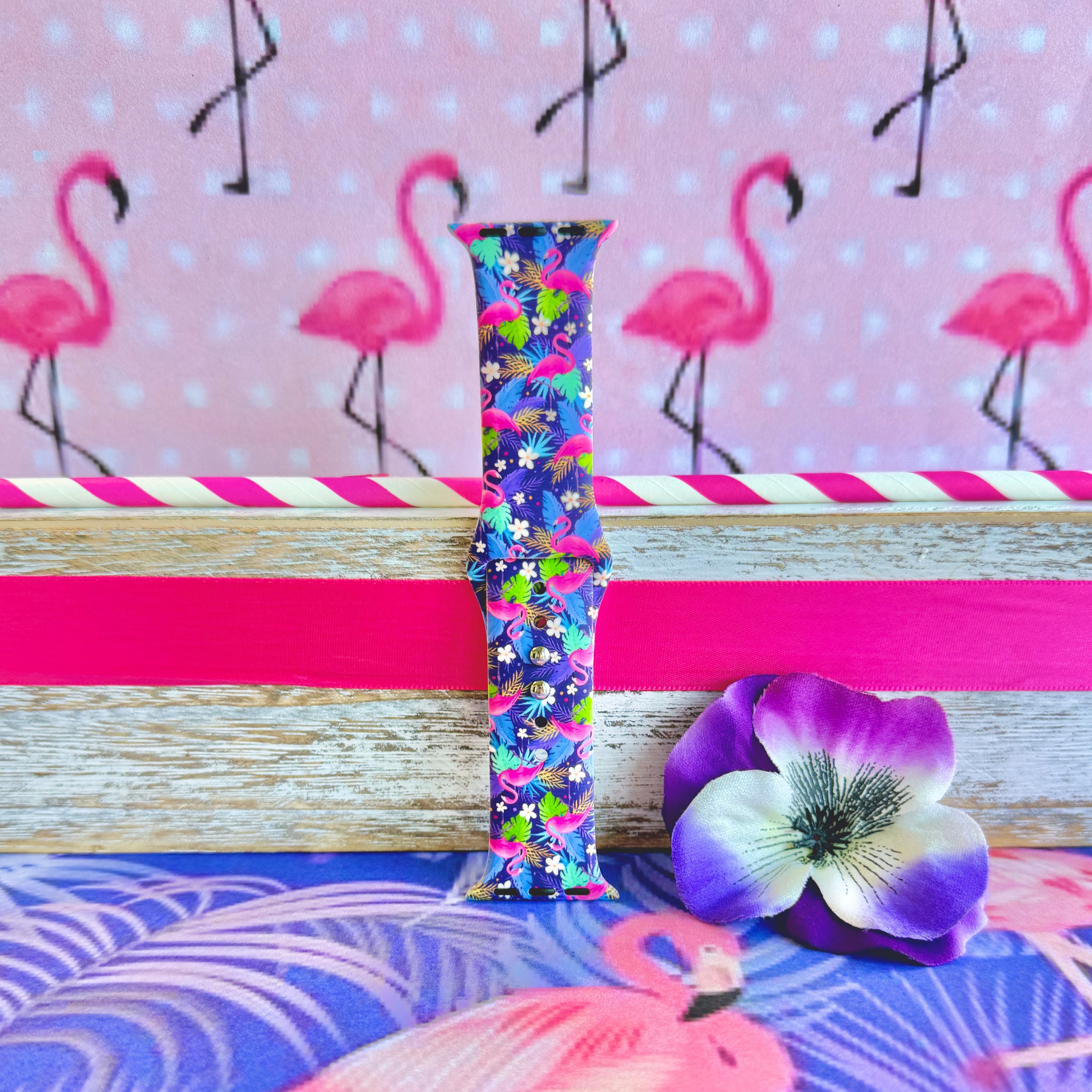 It's Giving Flamingo Apple Watch band with pink flamingos and tropical palm leaves on blue background with flamingo decorations
