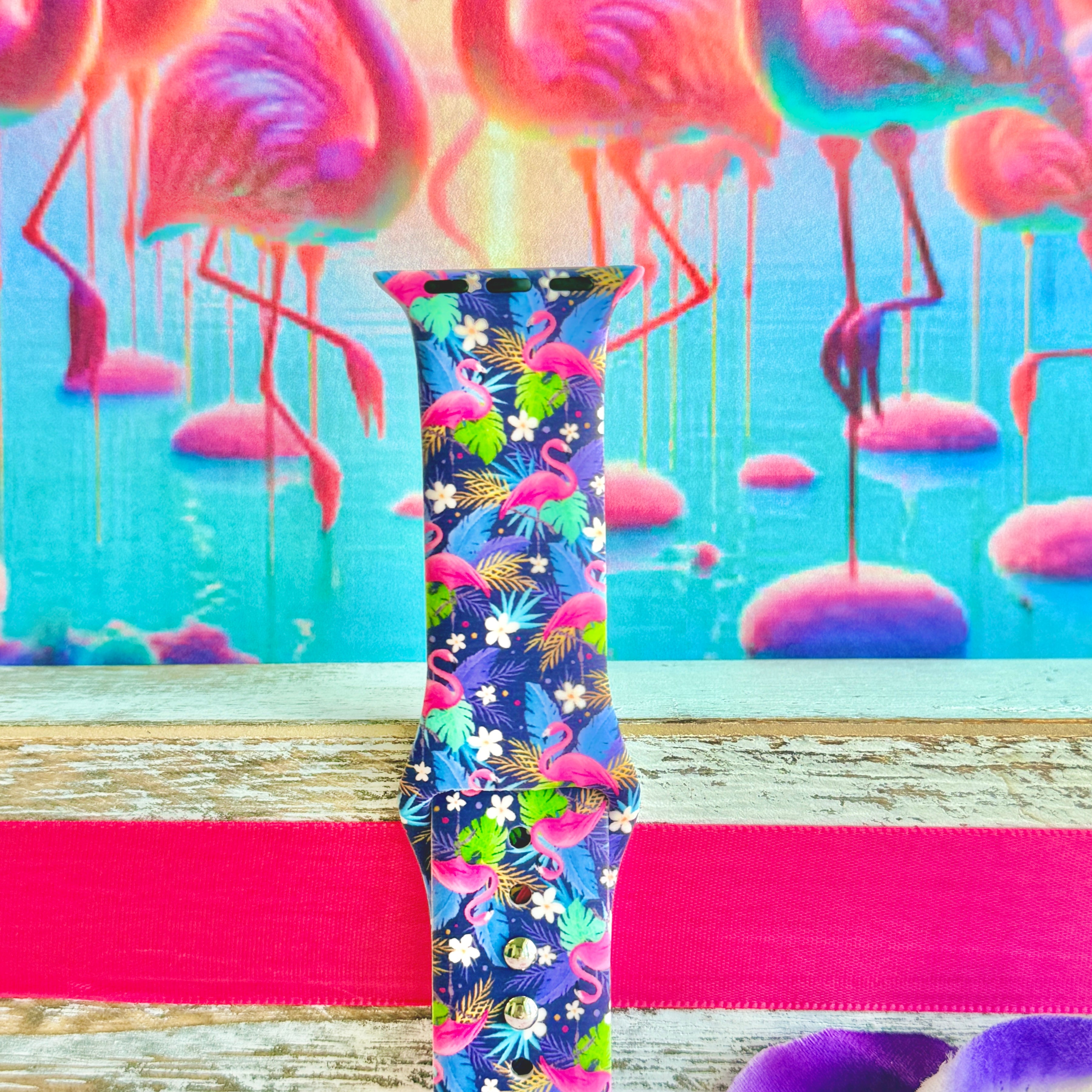 It's Giving Flamingo Apple Watch band with pink flamingos and tropical palm leaves on blue background with flamingo decorations
