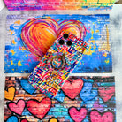 Love Riot graffiti street art MagSafe phone grip ring with colorful love text in pink teal and yellow on white background compatible with iPhone and Samsung