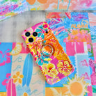 Sunset Hibiscus vibrant floral MagSafe phone grip ring with orange pink yellow and teal tropical pattern compatible with iPhone and Samsung