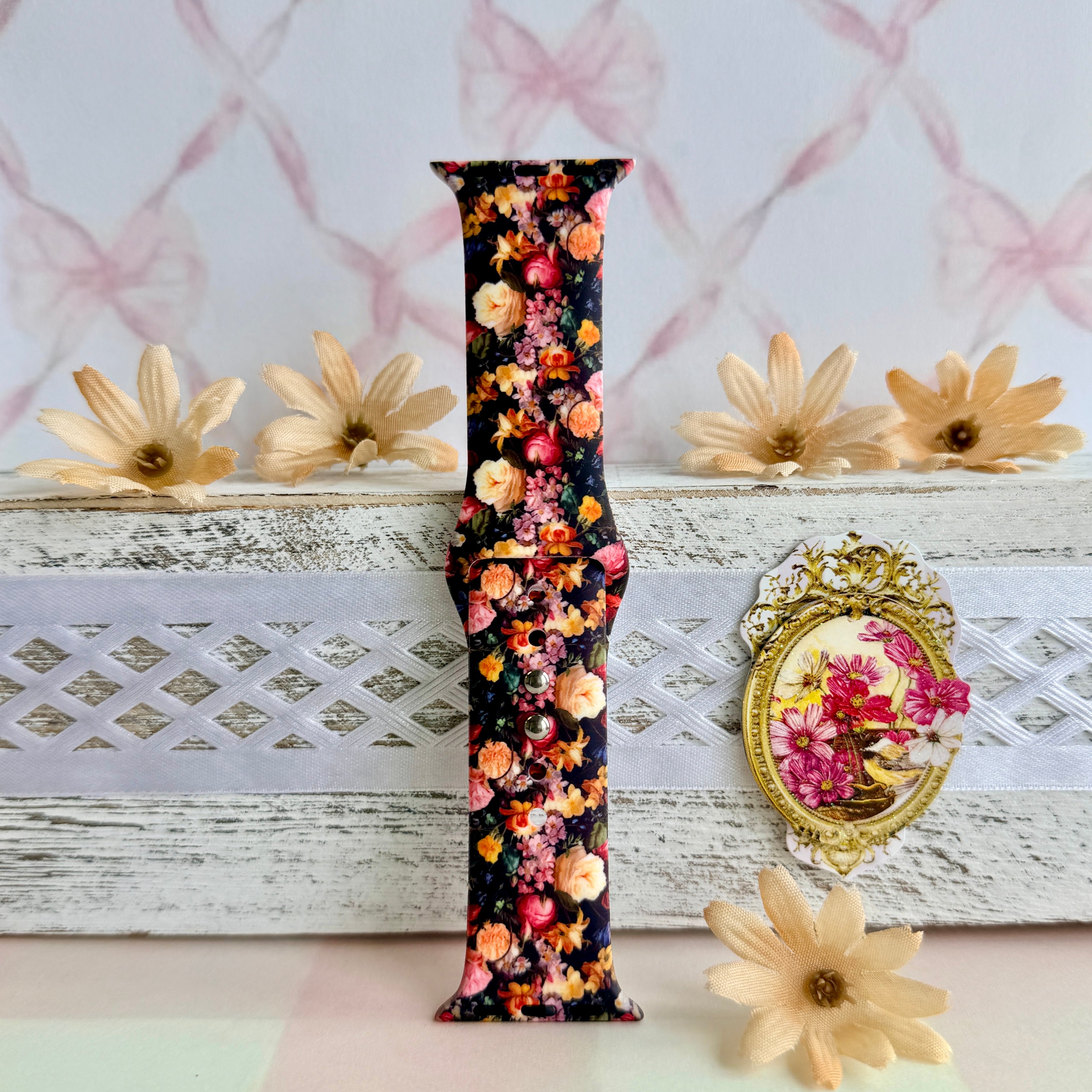 Twilight Bouquet Apple Watch band with vibrant pink, coral, and yellow flowers on black background with white daisies
