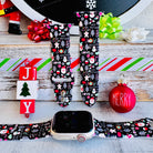jolly wrist-mas apple watch band – black silicone with santa, trees and joy/ love icons; fits 38–49 mm