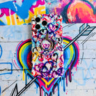 Love Out Loud colorful graffiti heart pattern MagSafe phone grip ring with overlapping neon pink purple and turquoise hearts compatible with iPhone and Samsung