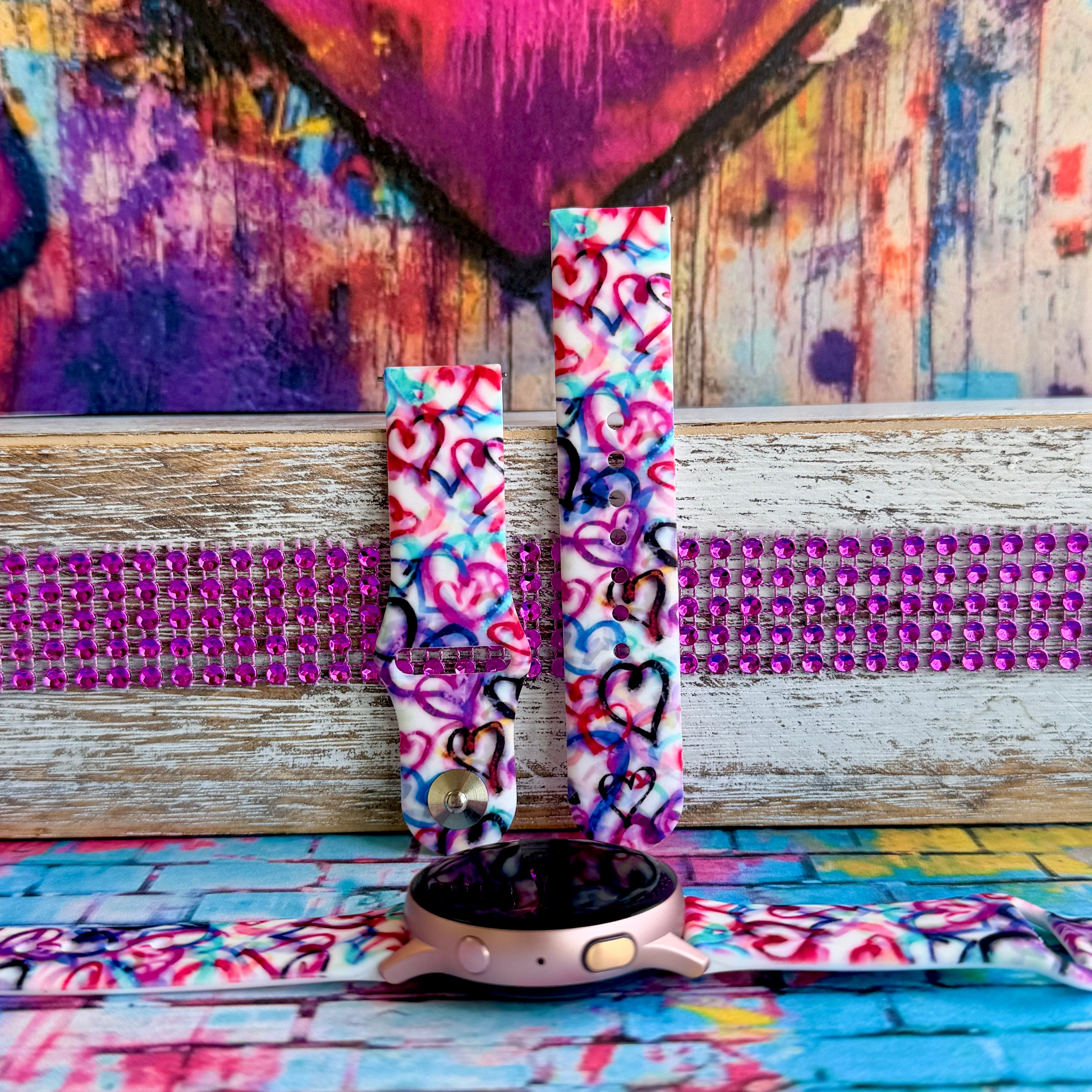 Bold graffiti heart silicone Samsung Watch band in pink, magenta, blue & teal. Street-art-inspired love print. Fits all Apple Watch models 38–49mm.