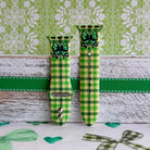 Green gingham Apple Watch band with bow detail on silicone strap