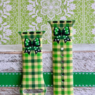 Green gingham Apple Watch band with bow detail on silicone strap