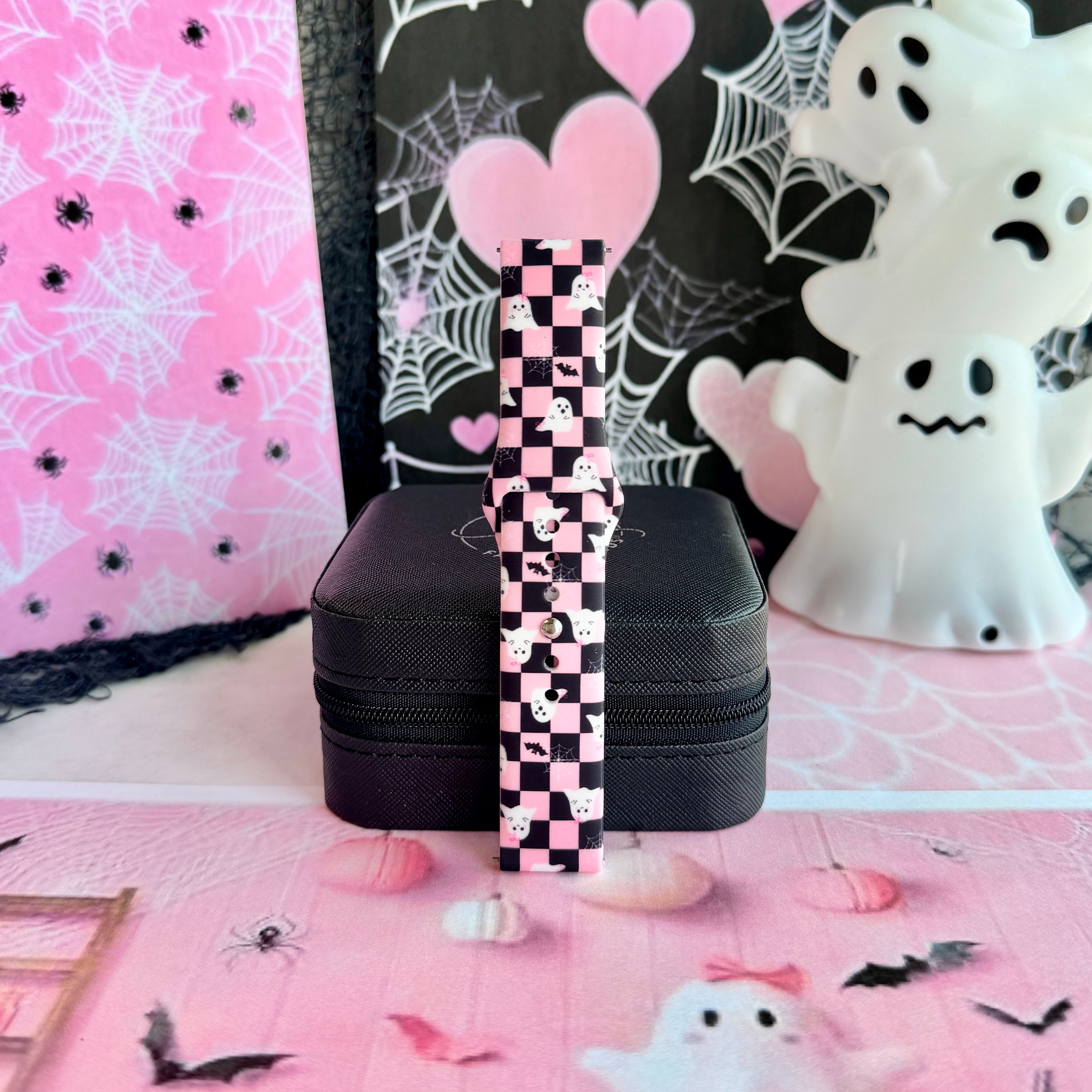 Hey Boo, Looking Cute silicone Samsung Galaxy Watch band displayed upright against a pink spiderweb and ghost backdrop.