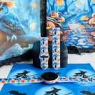The Bewitching Hour silicone Samsung Galaxy Watch band standing upright with a round rose gold Samsung watch at its base, light blue Halloween print.
