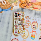 It's Giving Grandma Hobbies cozy grandmacore MagSafe phone grip ring with knitting yarn, rocking chairs, teacups, and pies on a white background compatible with iPhone and Samsung