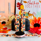 Sienna Petals silicone Samsung Galaxy Watch band shown in both sizes with a round rose gold Samsung watch at the base, cream rust floral print.
