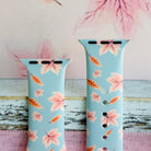 Both sizes of the Autumn Breeze Apple Watch band side by side, close view of the blush pink maple leaves on soft blue silicone.