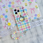 Wavy iPhone case featuring a multi-colored pastel gingham pattern in pink, yellow, green, and blue.