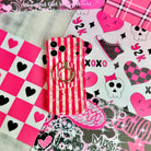 Trendy wavy iPhone case featuring a distressed pink and cream candy stripe pattern with a textured grunge static overlay and high-gloss finish.